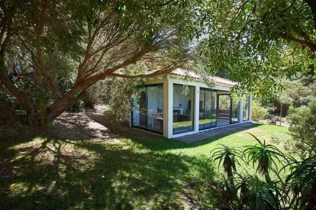 The pool house in the garden at Villa Rio Seco